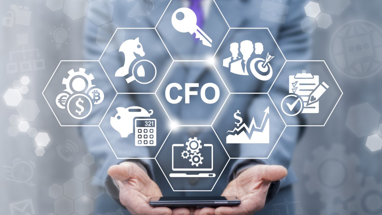 CFO - Chief Financial Officer business concept. Leadership, mobile internet technology, finance, strategy office work. Businessman offers smart phone with CFO icon on virtual screen.